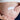 Schwangere cremt Babybauch mit boep Creme ein