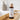 Naturkosmetik med Pflegebad von das boep und annisbuntewelt pflegender Badezusatz für trockene Haut und Neurodermitis steht auf einem Holztablett